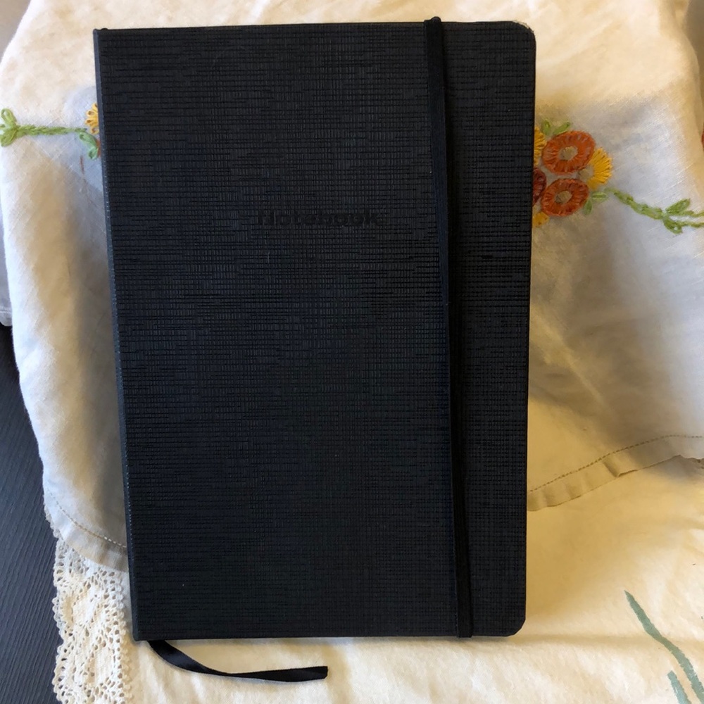 Black lined notebook